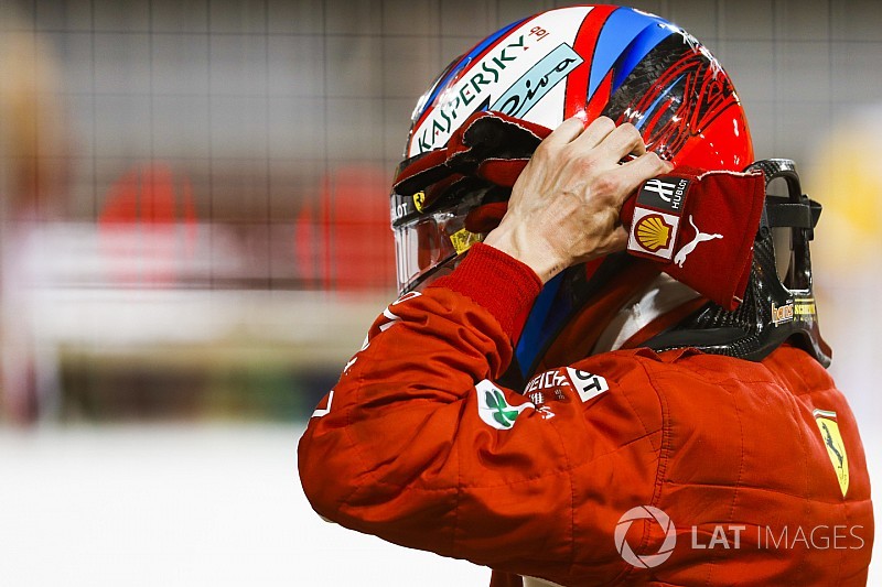 f1-bahrain-gp-2018-kimi-raikkonen-ferrari-takes-his-helmet-off-after-securing-second-on-th-8053993.jpg