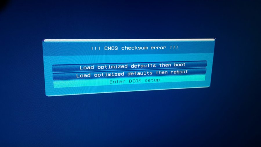 Load default. CMOS checksum Error defaults loaded. Ошибка CMOS checksum Error. Load CMOS defaults. BIOS checksum Error.