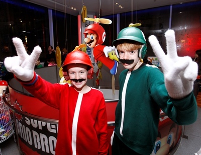 mario_bros_wii_launch-61258306857.jpg