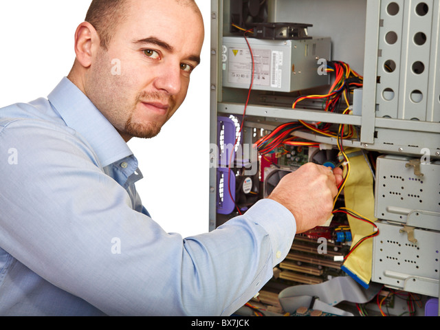 young-worker-on-duty-repair-pc-bx7jck.jpg